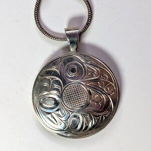 First Nations Sterling Silver Raven and Sun pendant necklace